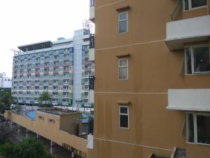 a view of a building from a window at DSV Margonda Residen 2 Apartment in Depok