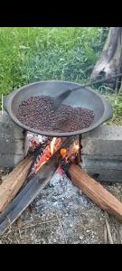 a grill with a lot of beans on it at Tetebatu flower in Tetebatu