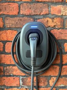 a hose is hooked up to a brick wall at The Annex EV 10 per night in Southport