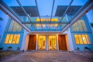 a building with a glass ceiling at Lovina Heights in Mount Lavinia