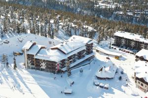 an aerial view of a resort in the snow at Ruka Chalets Royal Apartments in Ruka