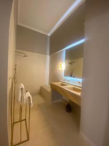 a bathroom with a sink and a mirror at Riad Djannaat Exceptional private riad pool staff in Marrakesh +68 photos