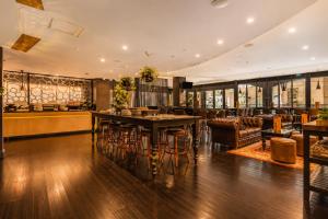 a dining room with a table and chairs at Stylish CBD 1BR - Gym & Lounge - Next to Chinatown in Melbourne