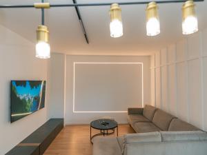 a living room with a couch and a table at ToRo Hospitality in Mostar