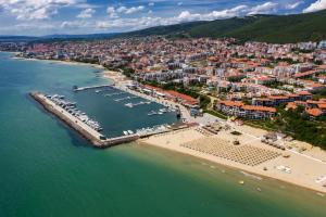 an aerial view of a beach and a harbor at Хотел Черно море in Sveti Vlas