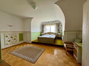 a large bedroom with a bed and a window at Seedri Guesthouse in Pärnu