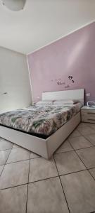 a bedroom with a bed in a room at Casa Vela in Riva del Garda