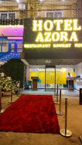 a red carpet in front of a hotel room at Staylo Hotel Azora in New Delhi