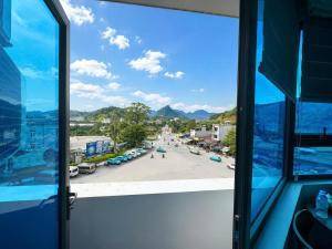 a view from a window of a parking lot at Như Ý Hotel Hà Giang in Ha Giang