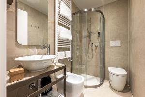 a bathroom with a shower and a toilet and a sink at Ca' Del Campo in Venice +45 photos