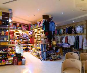 a store with a lot of merchandise in a room at Vivian AL Shasha in Mecca