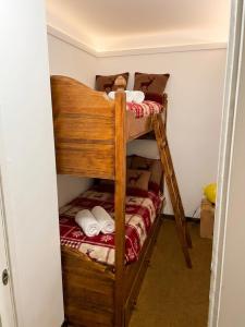 a bedroom with two bunk beds in a room at We ski Matese in San Massimo