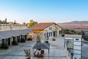 an aerial view of a building with a patio at Briaa Wellness Resort Hotel Gilboa - Adults Only in Maalé-Hagilbo‘a