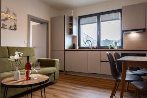 a living room with a couch and a table at Levander 2 in Králiky