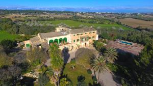 an aerial view of a large house with trees at Agroturismo Son Sant Andreu in Petra