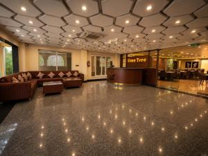 a large lobby with couches and a waiting room at Lime Tree Hotel & Banquet Jal Mahal Jaipur in Jaipur