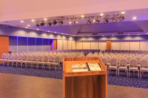 a room with rows of chairs and a podium at Orka Sunlife Resort Hotel and Aquapark in Oludeniz +263 photos