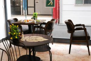 a table and chairs with food on top of it at Kriti Hotel Antalya in Antalya +63 photos