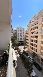 a view from a balcony of a city with buildings at Casa Vlora in Vlorë