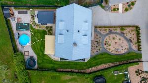an overhead view of a building with a garden at Chata Markétka in Dobré