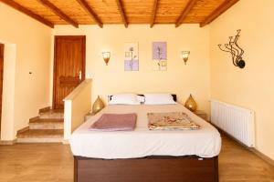 a bedroom with a bed in a room with stairs at Cozy vacation home in Alfaz del Pi +22 photos