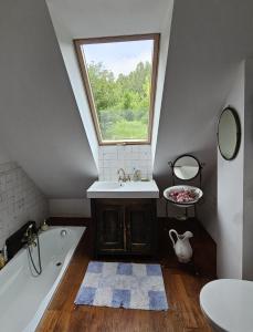 a bathroom with a sink and a window at Gałęziówka, Doły Biskupie in Kunów +37 photos
