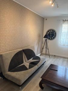 a living room with a couch and a table at Casa Lia in Ortiporio +1 photo