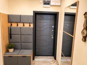a door in a room with a closet at Apartment Be Happy 6, Premium Apartment in Ruse City Centre in Ruse