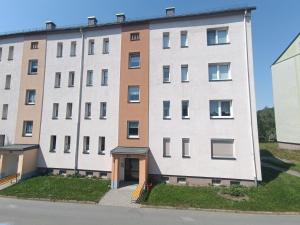an apartment building with a door in front of it at Ferienwohnung Karl 54 in Gelenau