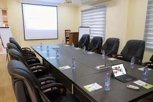 a meeting room with a long table and chairs at Nyansapo Eco Resort in Cape Coast +21 photos