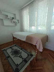 Kama o mga kama sa kuwarto sa Apartman Vuk