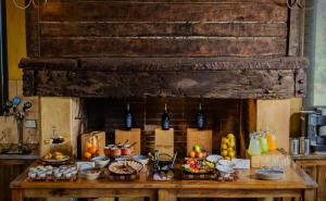 a table with a bunch of food on it at Andeluna Winery Lodge in Tupungato