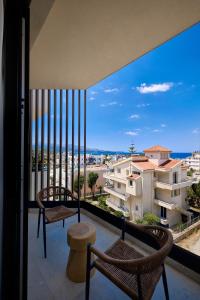 a balcony with a view of a city at Veranda Hotel by Mirage in Ksamil