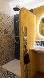 a bathroom with a shower and a sink at Studio Agave in Correns
