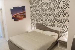 Posteľ alebo postele v izbe v ubytovaní Metronia Guest House