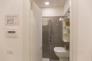 Kúpeľňa v ubytovaní Metronia Guest House