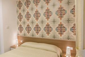 Posteľ alebo postele v izbe v ubytovaní Metronia Guest House