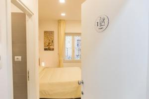 Posteľ alebo postele v izbe v ubytovaní Metronia Guest House