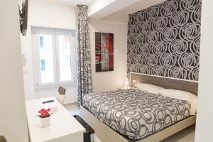 Posteľ alebo postele v izbe v ubytovaní Metronia Guest House