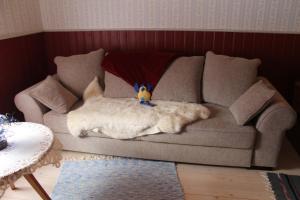 Posezení v ubytování Posti Holiday Home