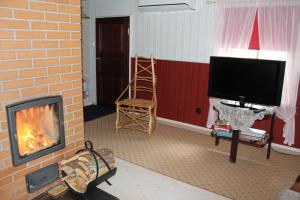 TV a/nebo společenská místnost v ubytování Posti Holiday Home