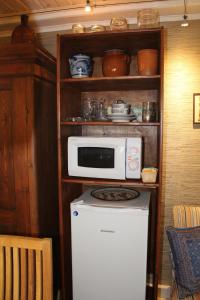 Kuchyň nebo kuchyňský kout v ubytování Posti Holiday Home