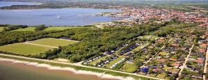 an aerial view of a town next to the water at Morsø Camping in Nykøbing Mors +10 photos