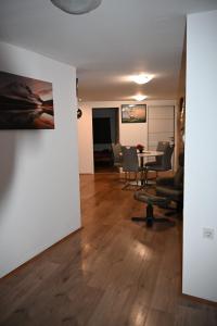 a living room with a table and chairs at Leona in Senj