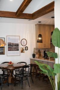a kitchen and dining room with a table and chairs at Orion B, Vaulted Ceilings, Pool, Bunk Room in Port Isabel
