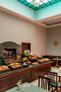 a buffet line with many different types of food at Hotel Diocleziano in Rome