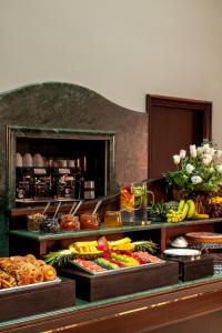 a buffet line with many different types of food at Hotel Diocleziano in Rome