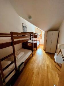 a bedroom with two bunk beds in a room at Kerstin 10 in Rauris