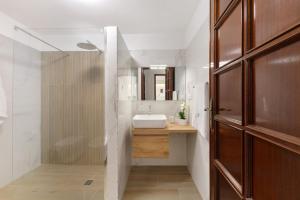 a bathroom with a sink and a mirror at cmv Salento in Marina di Pescoluse +43 photos