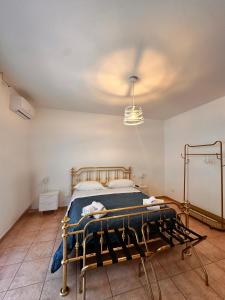 a bedroom with a bed with a ceiling at Bari Double Sea View in Bari